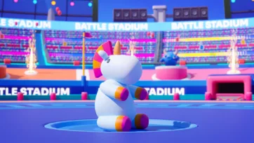 3D battle stadium featuring white unicorn mascot with colorful mohawk on platform, showing detailed stadium lighting and effects
