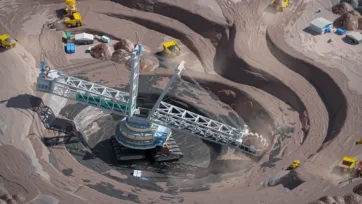 3D low poly dragline excavator operating in circular open pit mine with support buildings and haul trucks