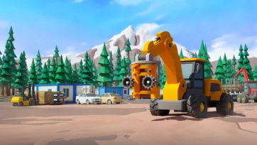 Yellow heavy machinery and excavator operating at forestry site with processing buildings and vehicle fleet in mountain setting