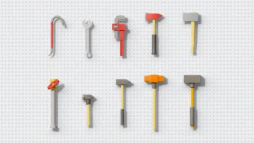 3D low poly hand tools set including crowbar, wrench, pipe wrench, axes and hammers with wooden handles