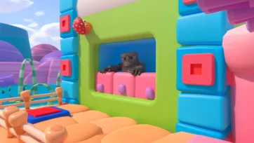 Adventure Land 3D low poly train car with stone gorilla character passenger, colorful modular building blocks, and tropical setting