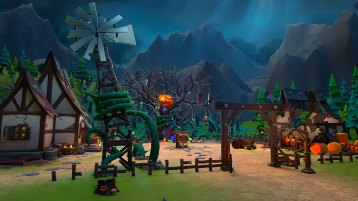 Halloween village with pumpkin jack-o'-lantern, windmill, and spooky trees.