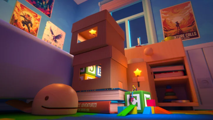 Cardboard fort and toys in a child's room with adventure posters.